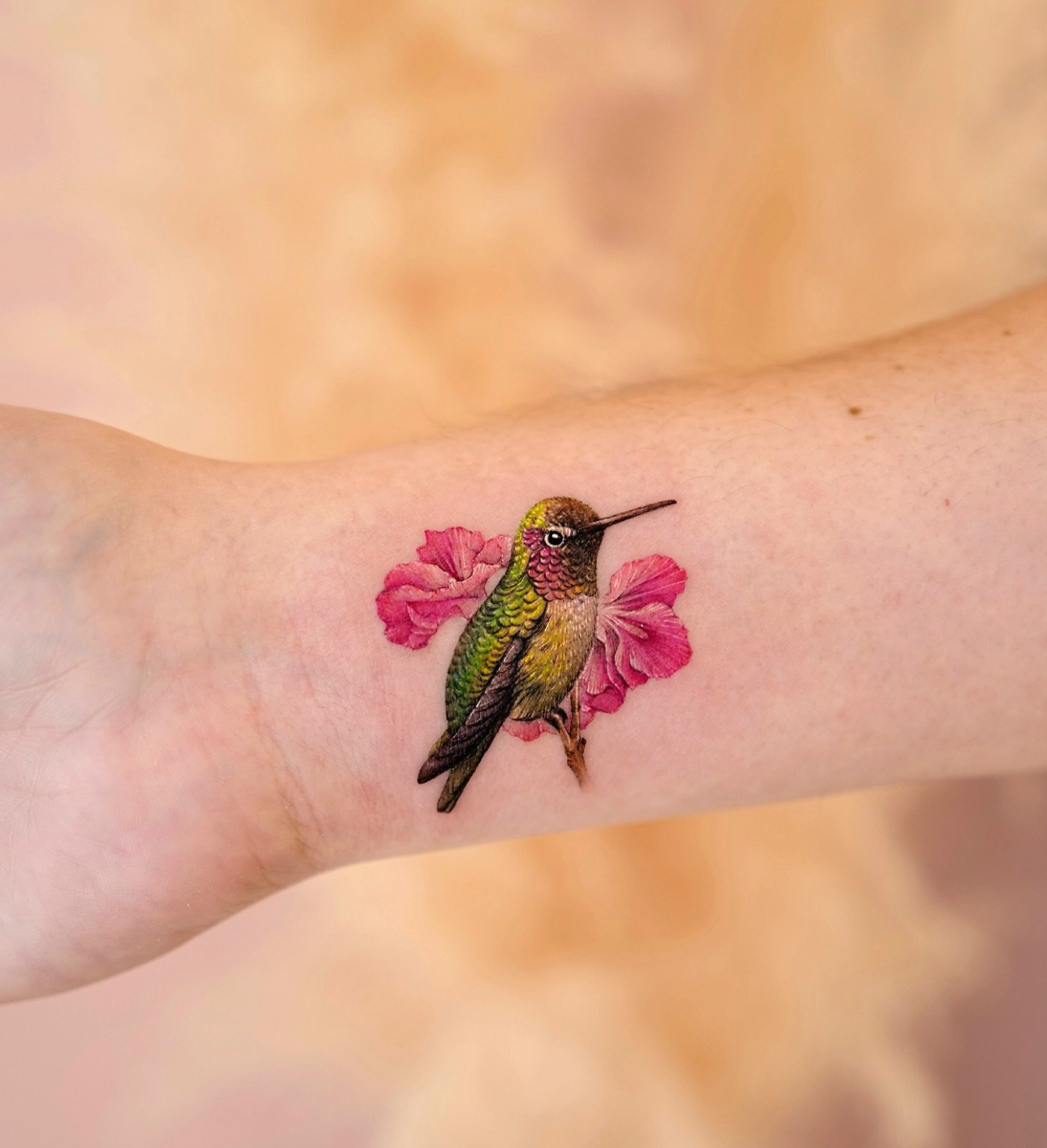 hummingbird and flower realism style tattoo by Jia Kim