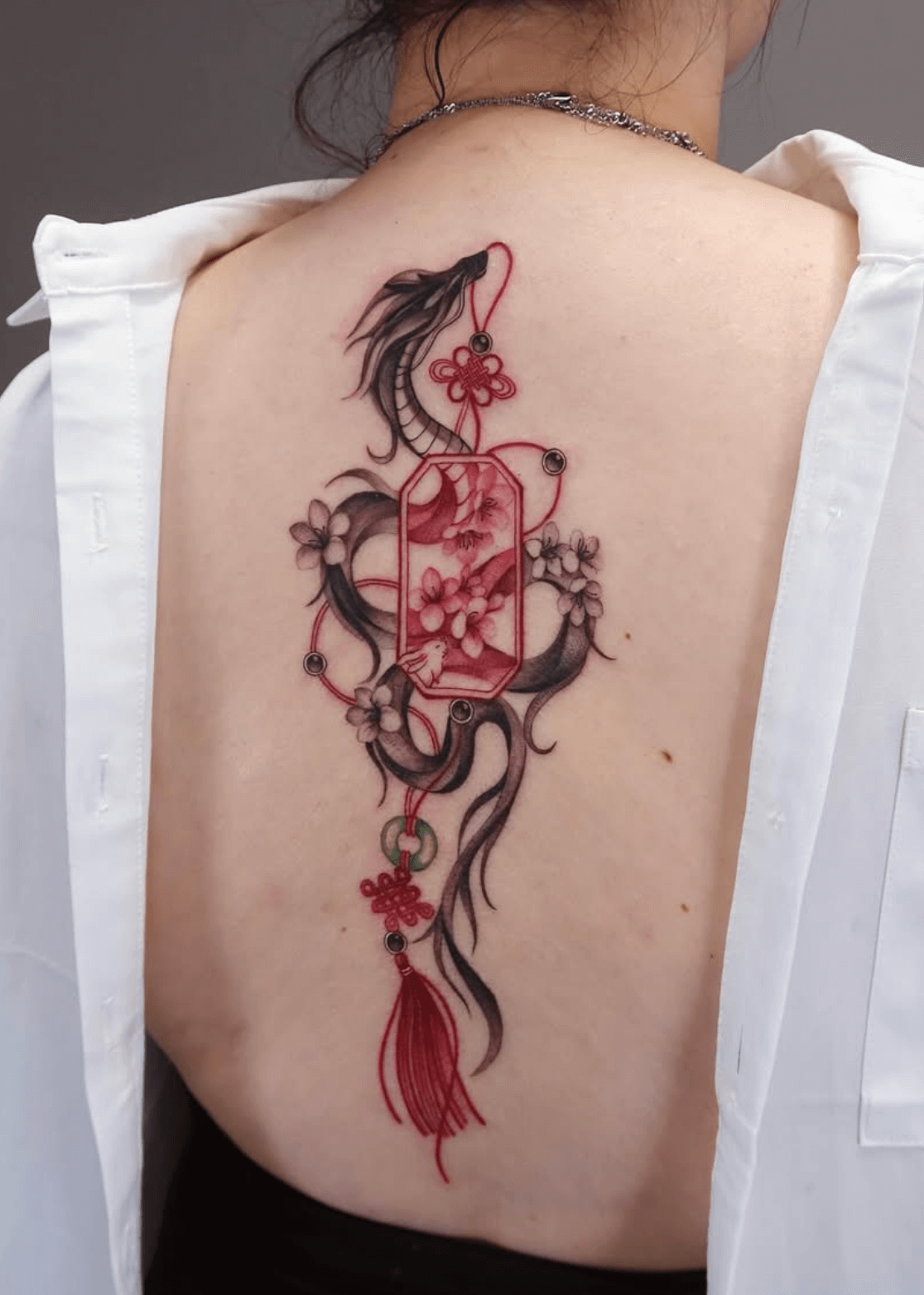 dragon fine line style tattoo by Mina