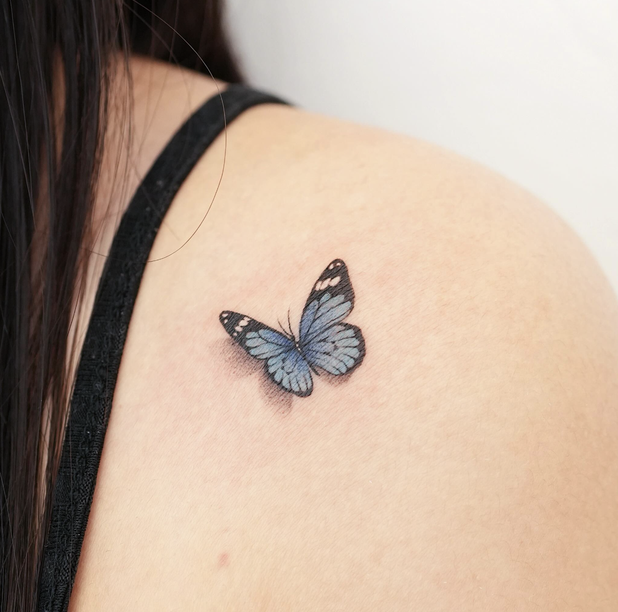 micro realism style tattoo by Tina Choi