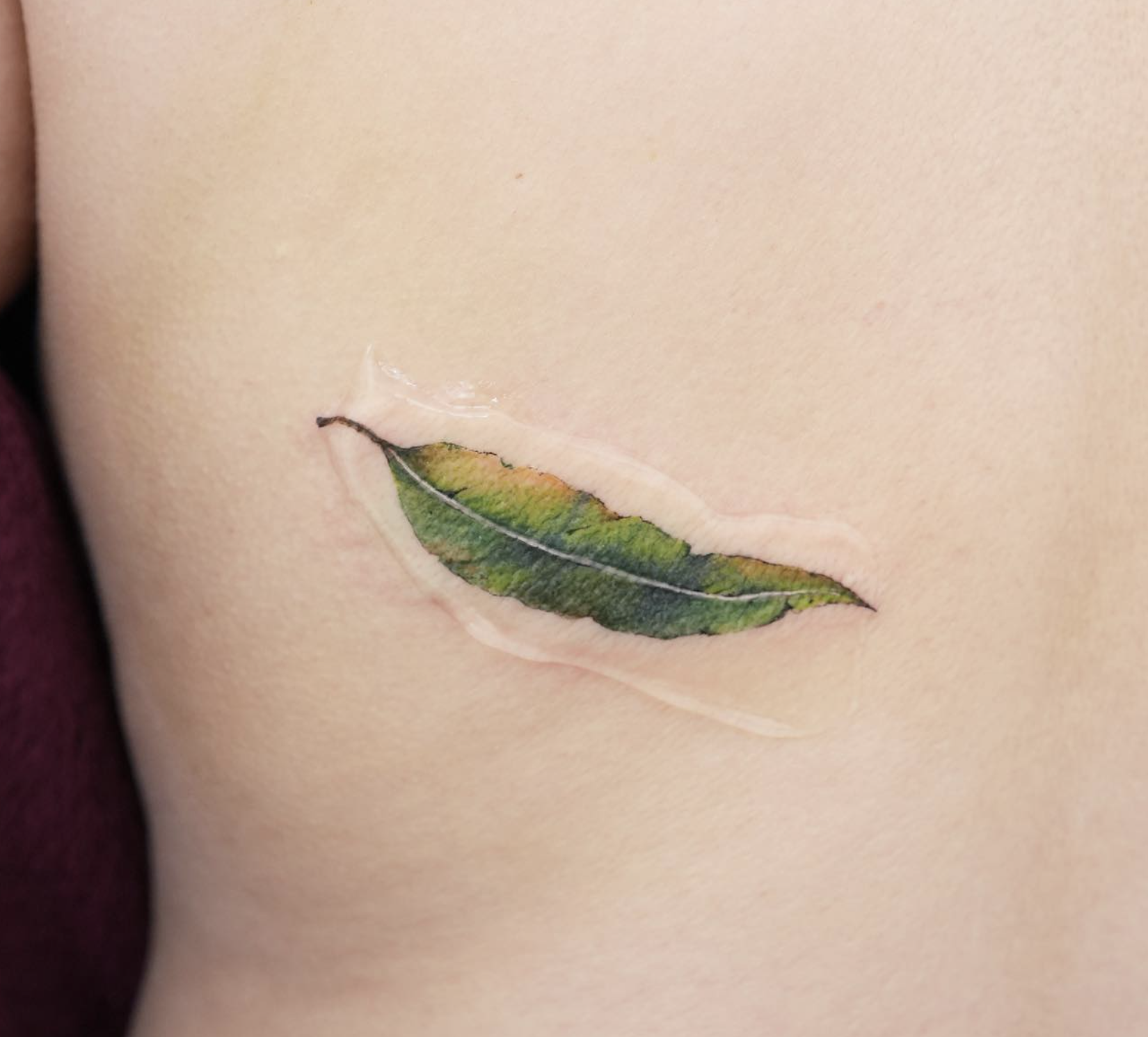 realism style tattoo by Tina Choi