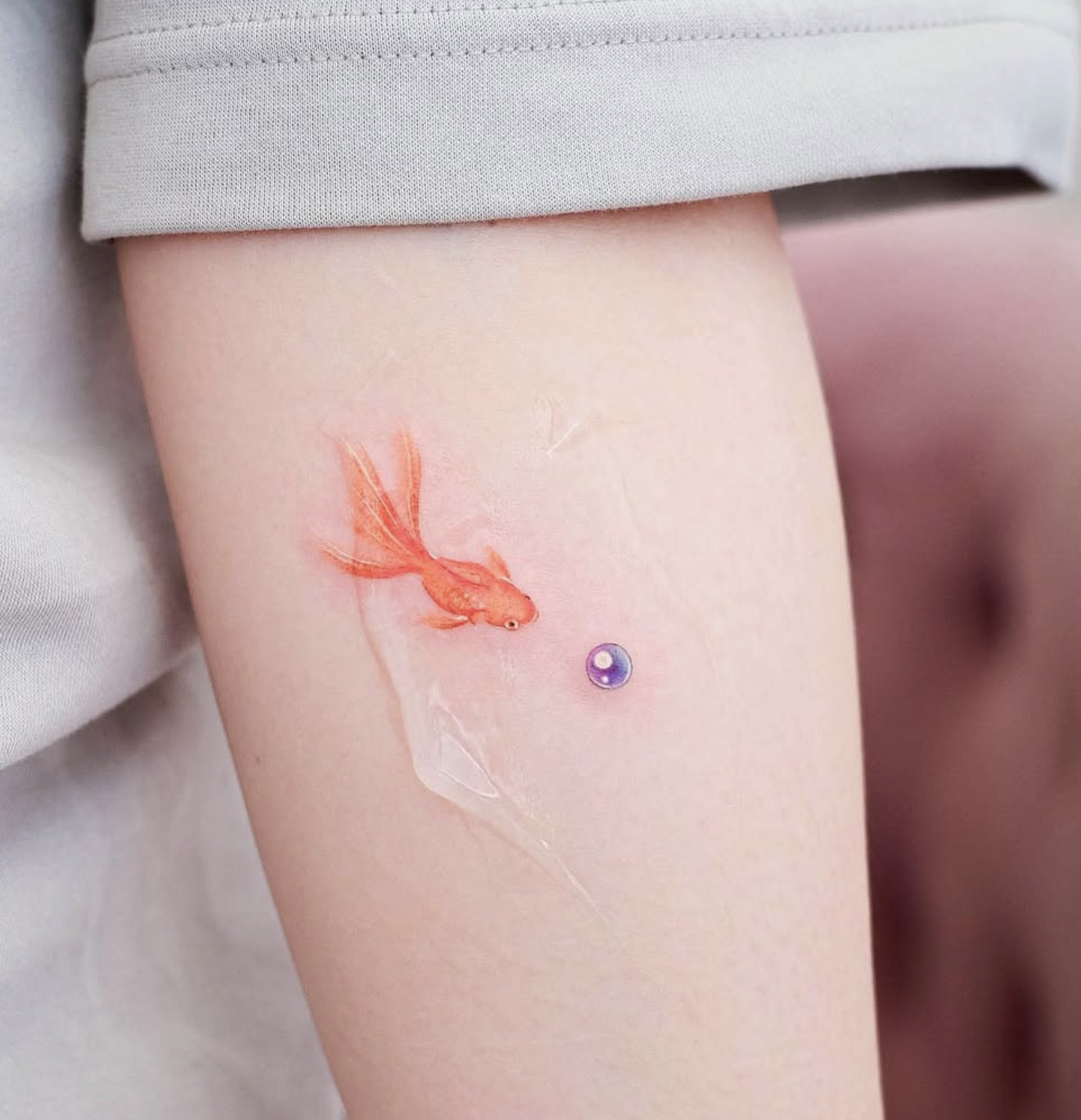 micro realism style tattoo by Avis