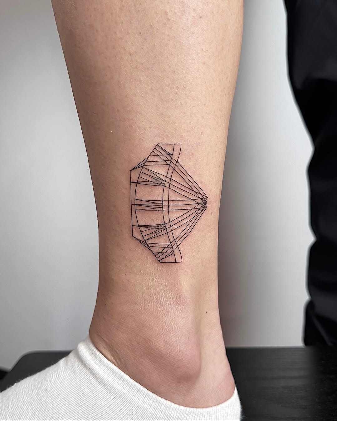 geometric shape and abstract form fine line style tattoo by Katya