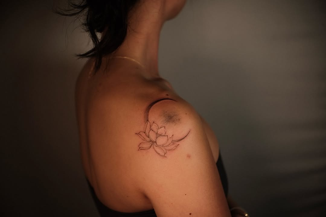 flower and lotus fine line style tattoo by Viktoria