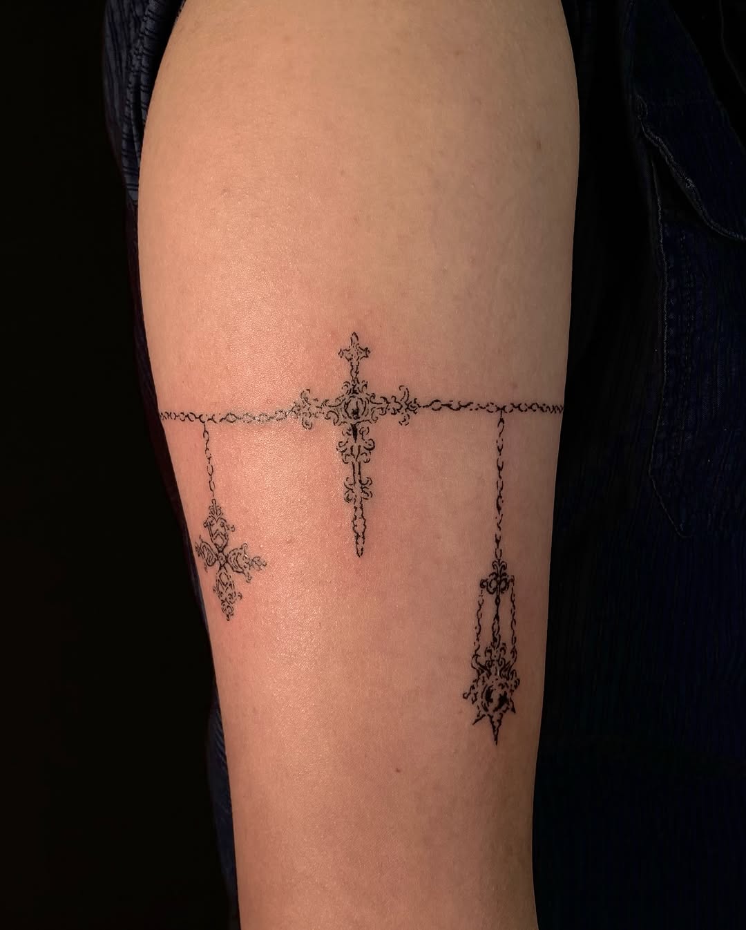chain and ornament fine line style tattoo by Elizah