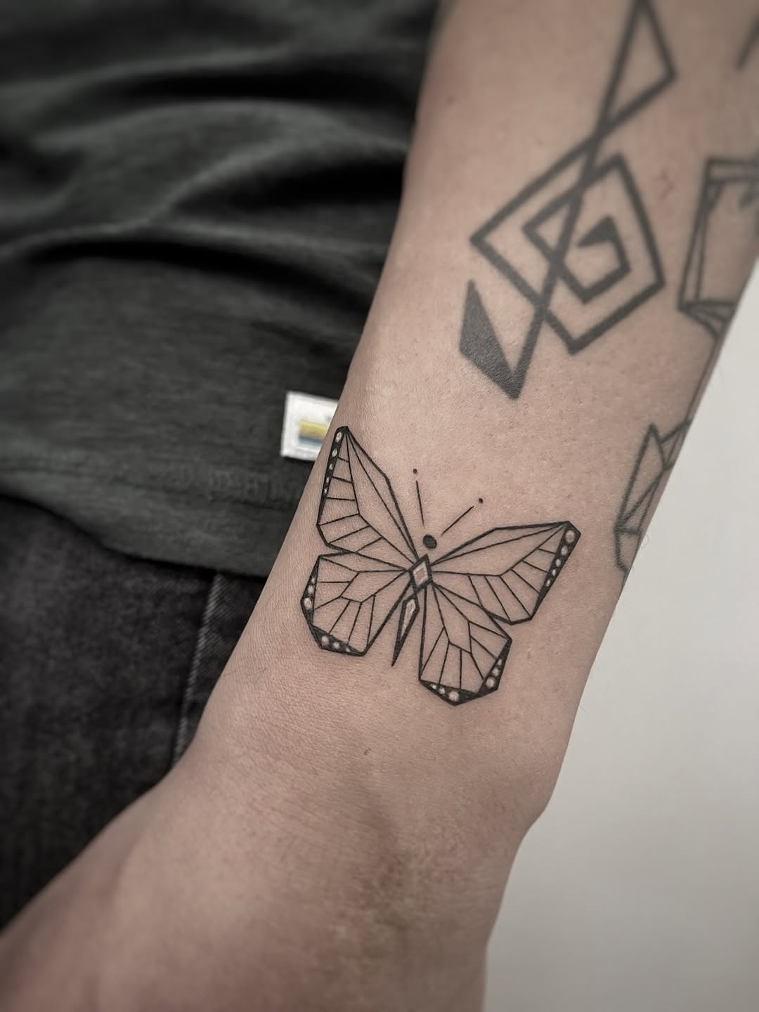 geometric style tattoo by Sirimontra