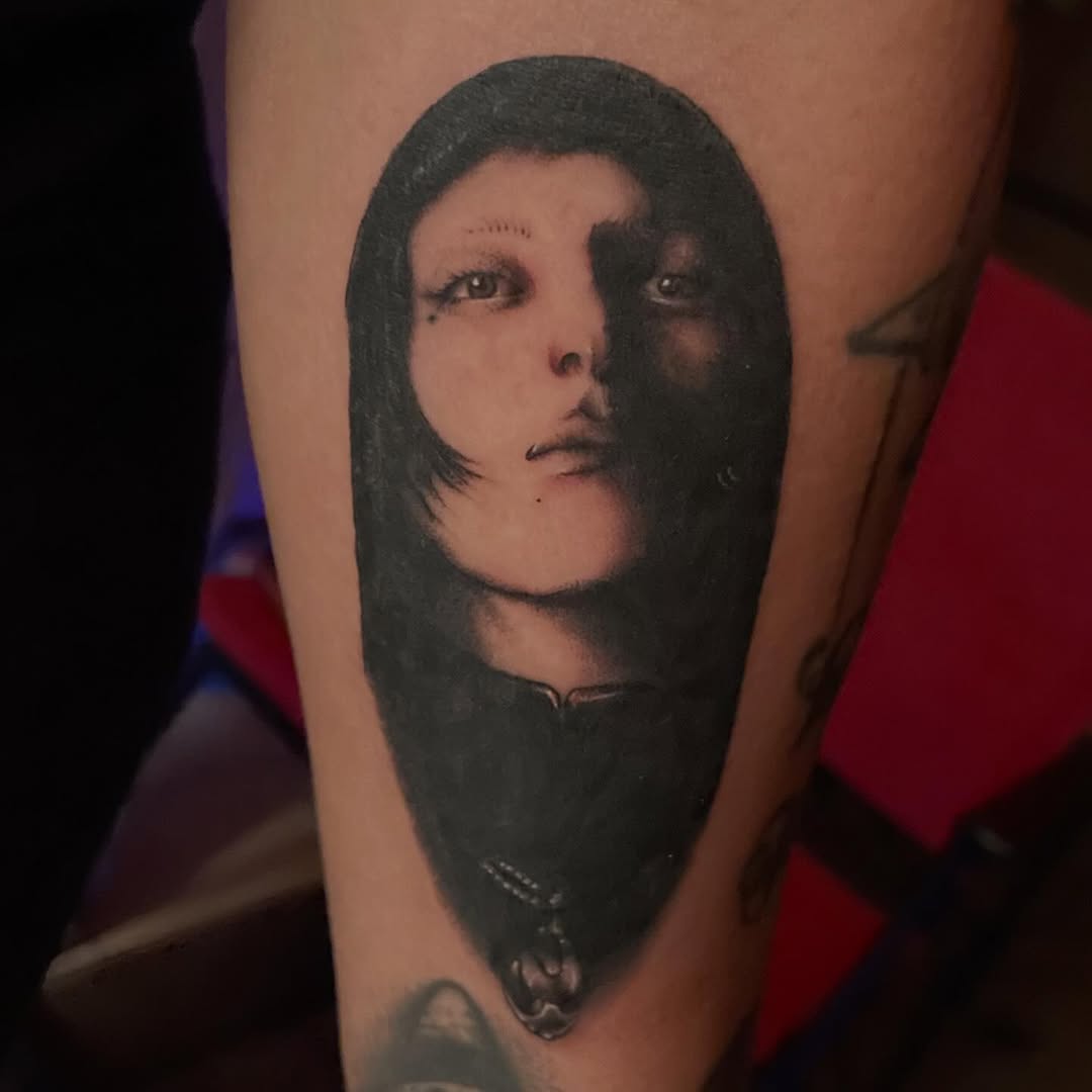 realism style tattoo by Ant
