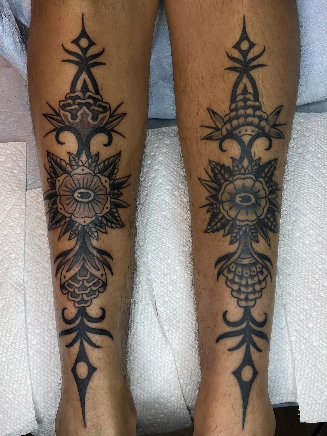 geometric shape and flower ornamental style tattoo by Claudia