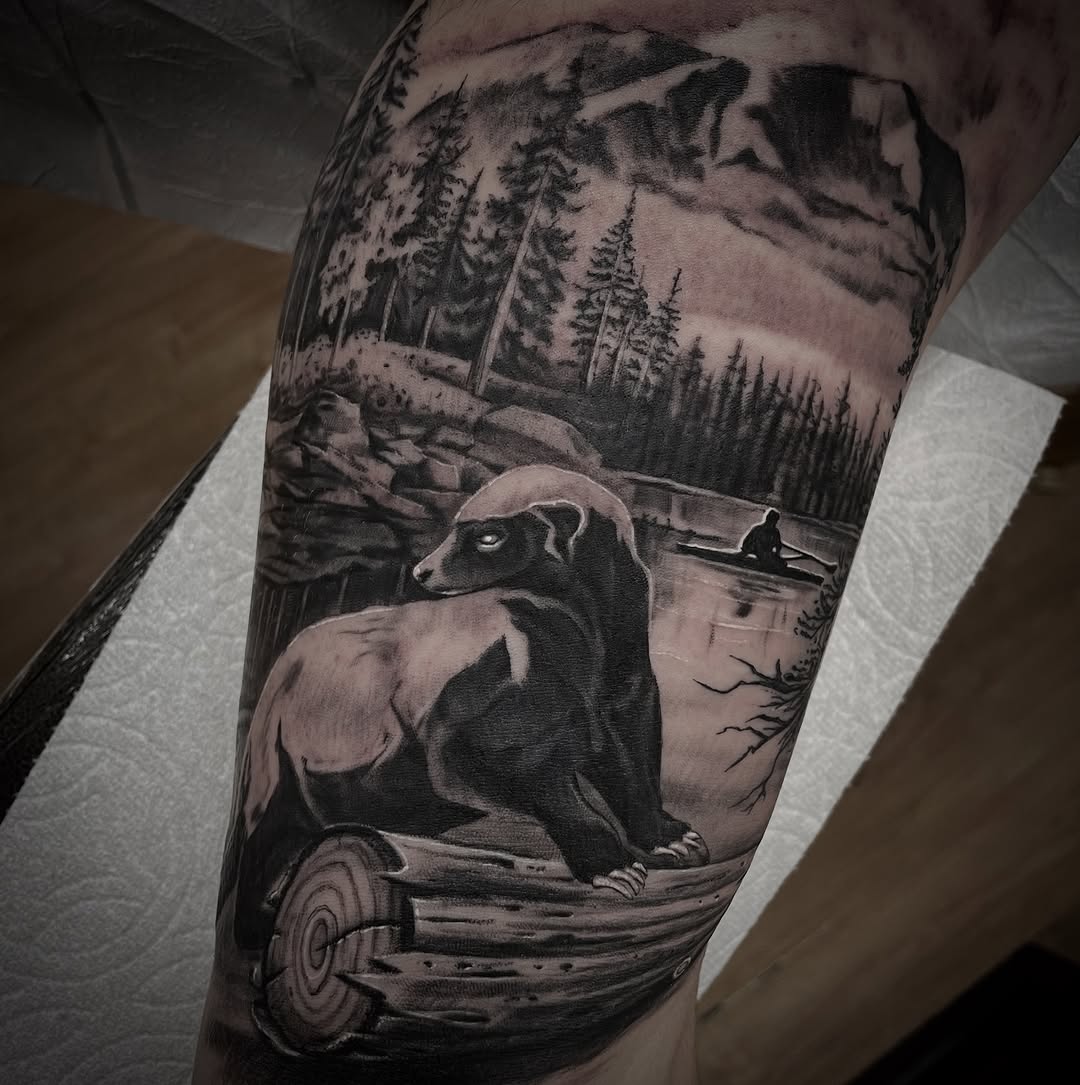 person and mountain realism style tattoo by Brian Jones