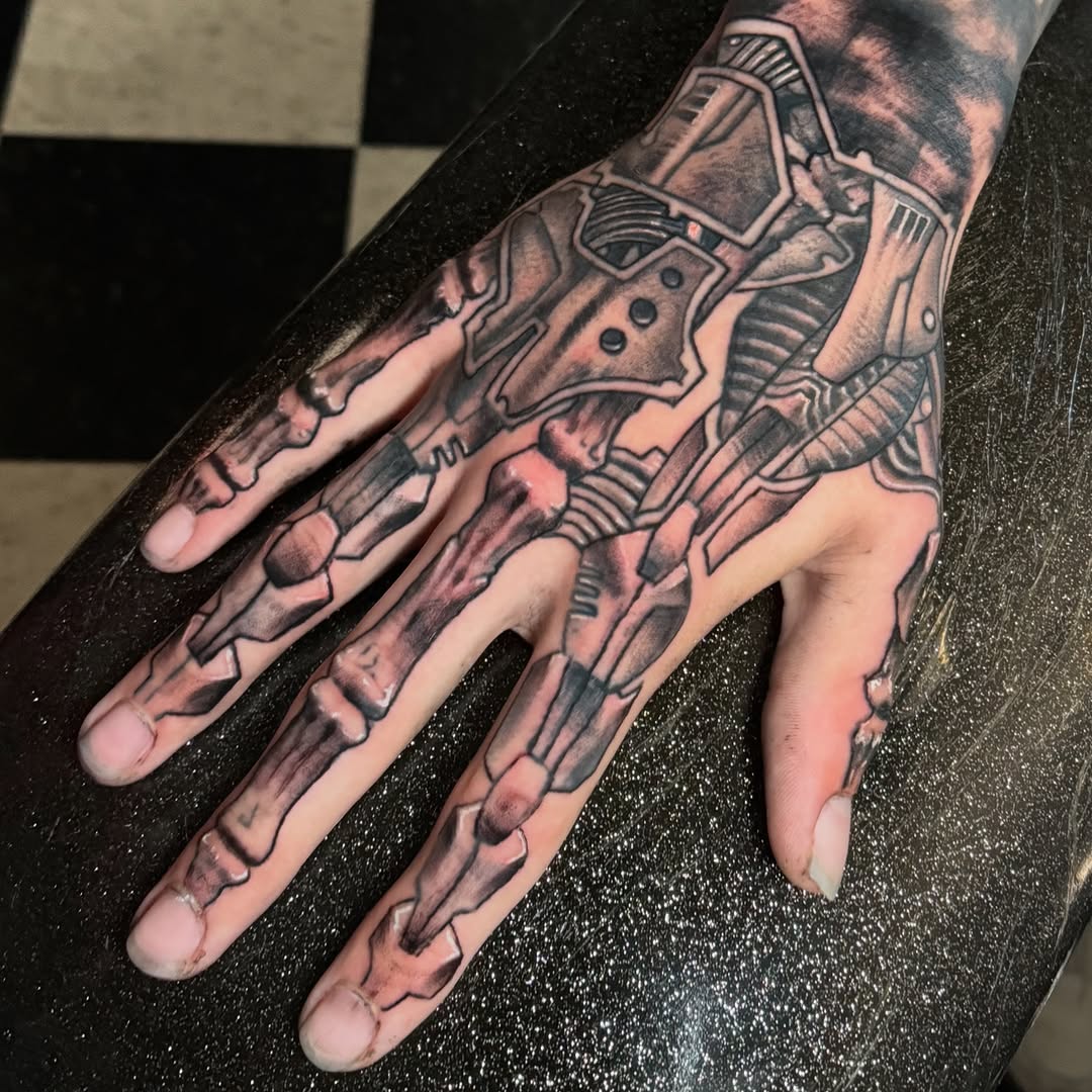 biomechanical style tattoo by Oliver