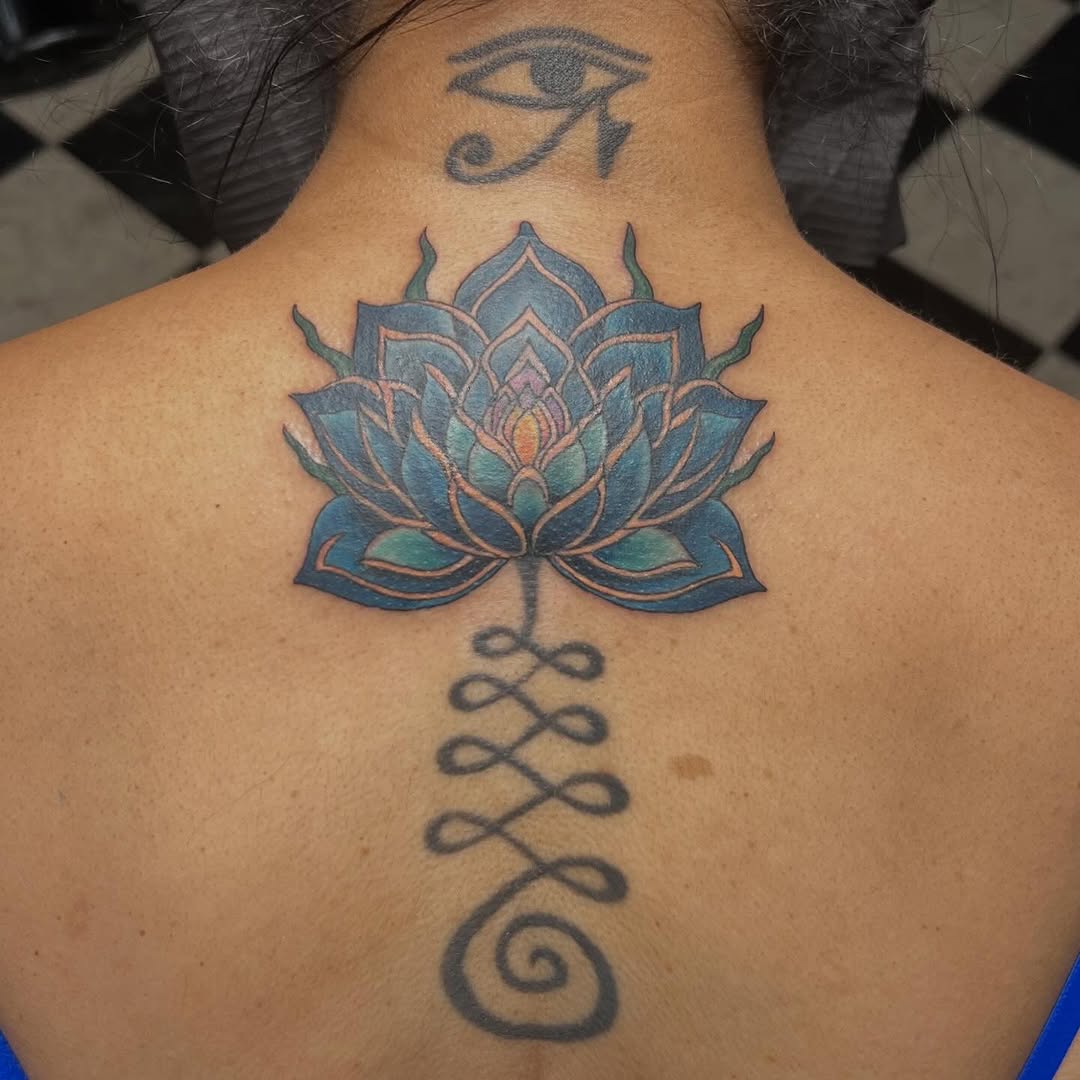 Lotus and spiritual symbols on back