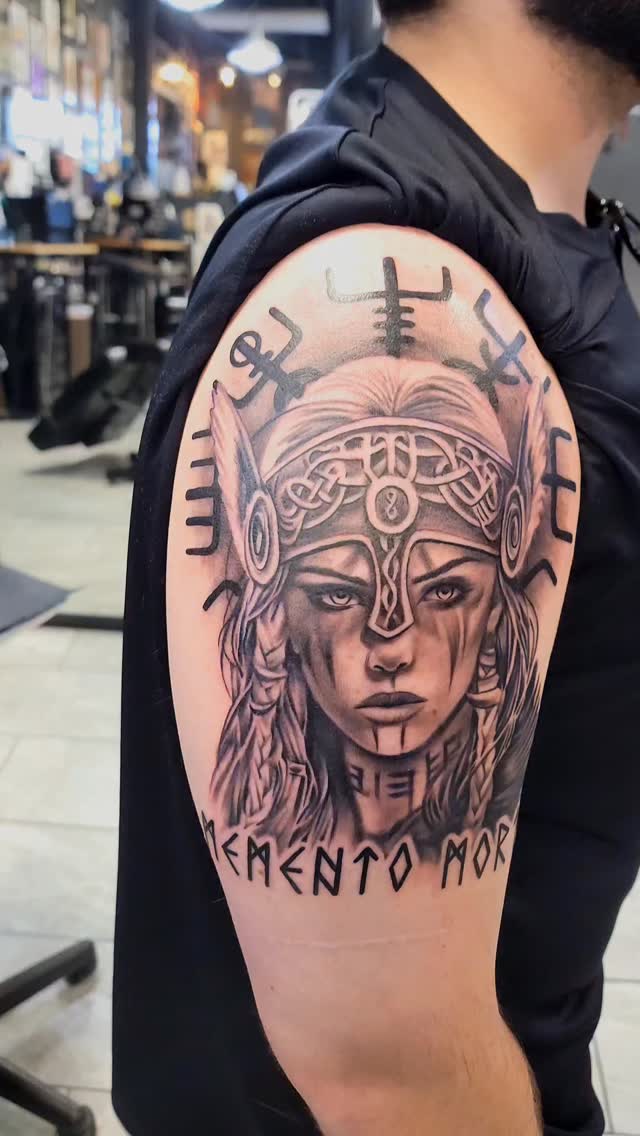 helmet and wing realism style tattoo by Rich