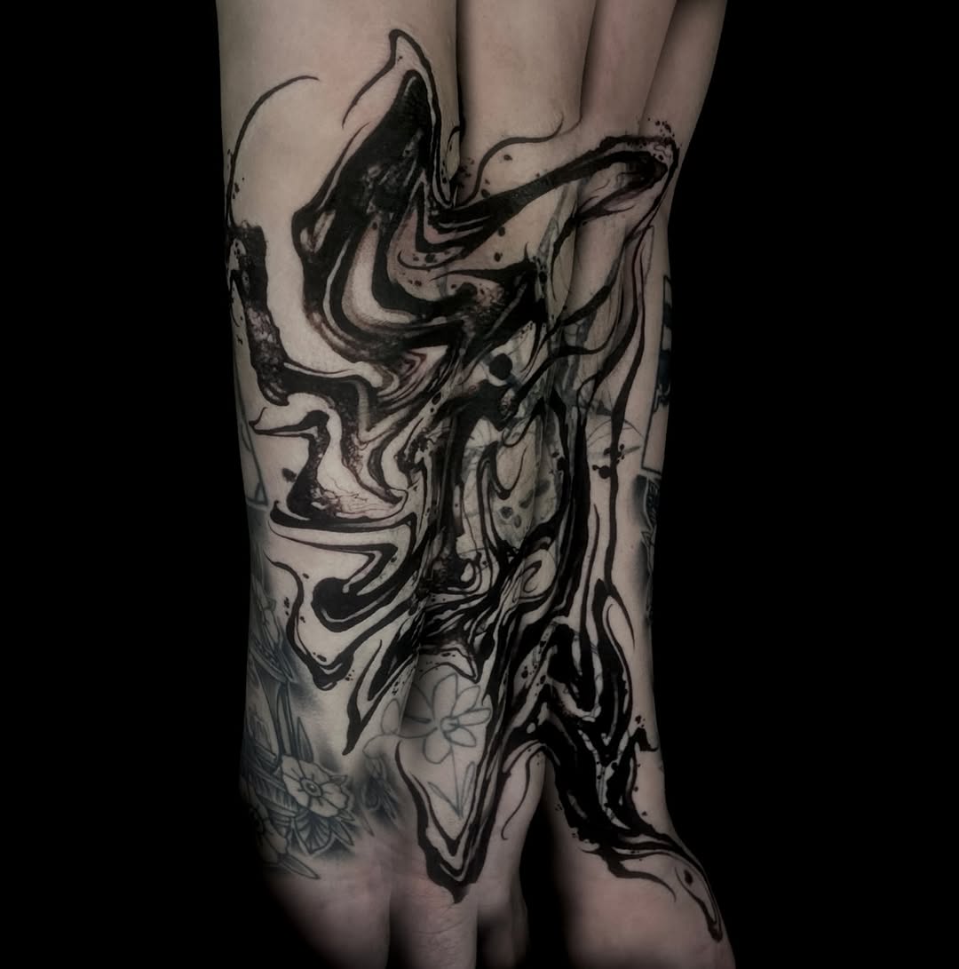 swirl and fluid form abstract style tattoo by Nathan