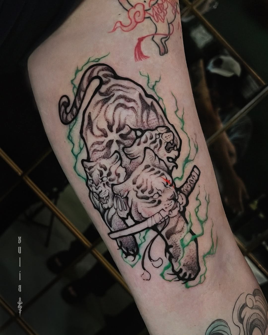 neo-traditional style tattoo by Patrick