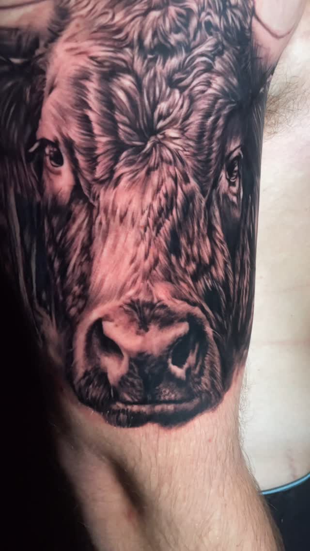 realism style tattoo by Justin Reid