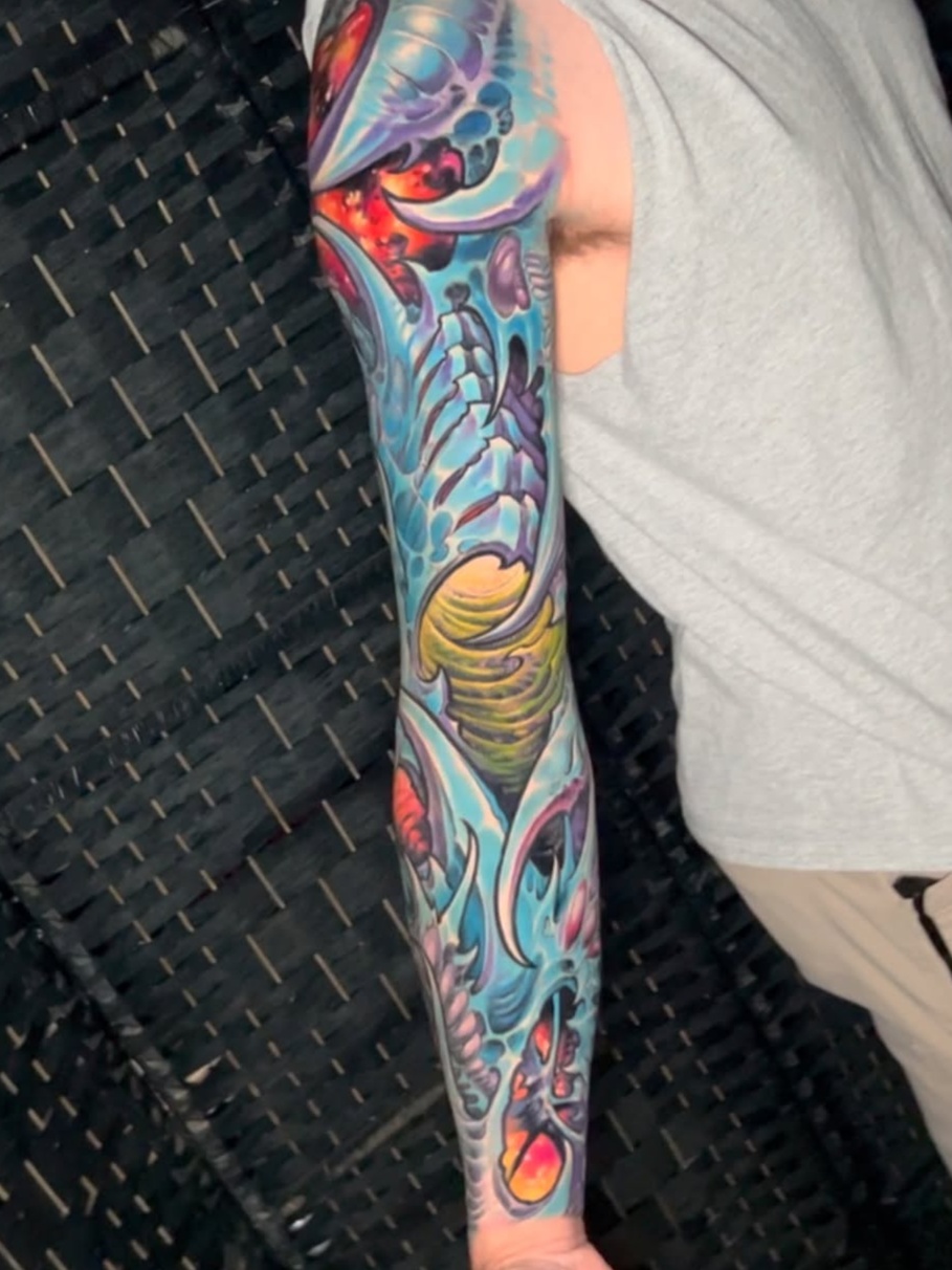 biomechanical style tattoo by Ron Earhart