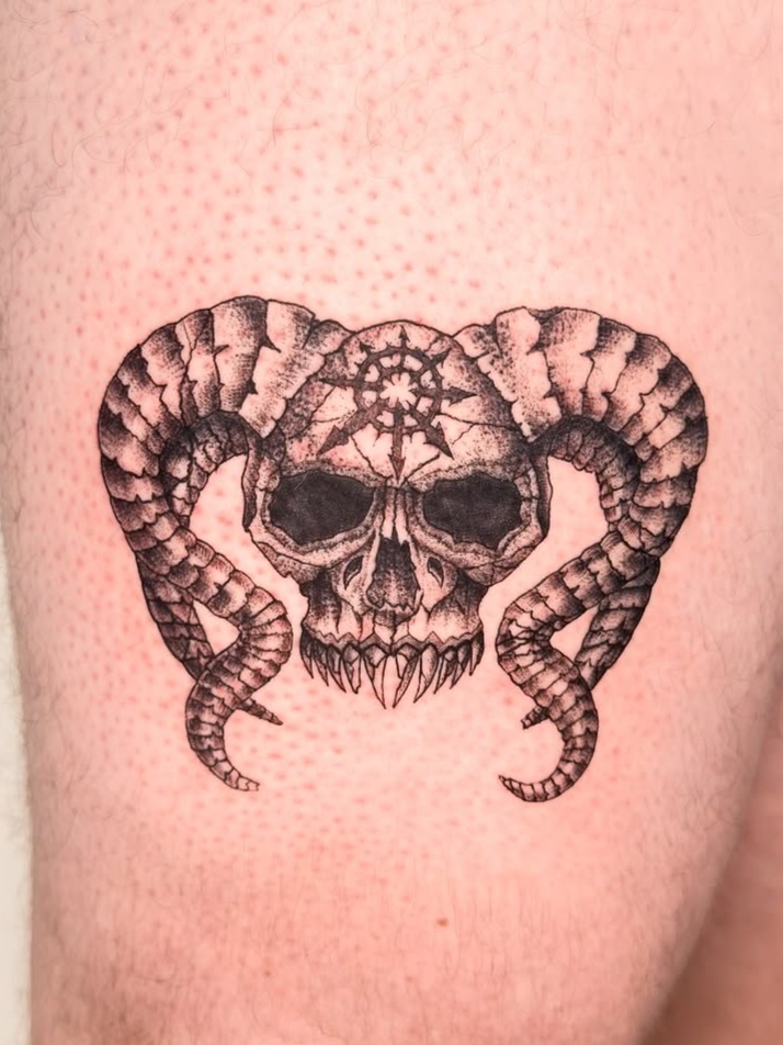 blackwork style tattoo by Manny