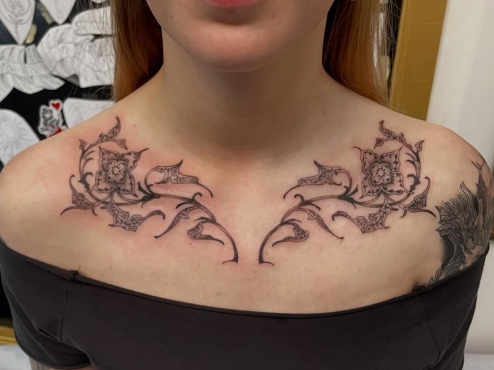 vine and flower ornamental style tattoo by SOFI
