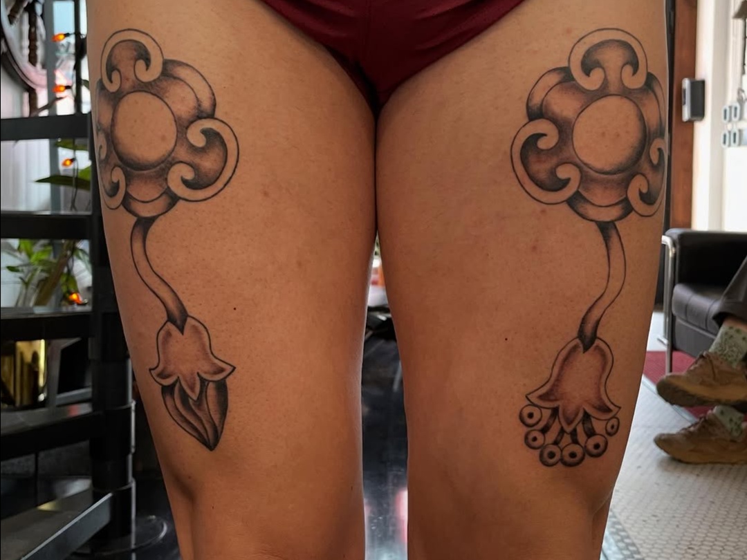 Symmetrical ornate botanical shapes