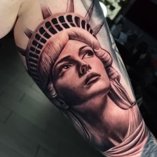realism style tattoo by Justin Reid