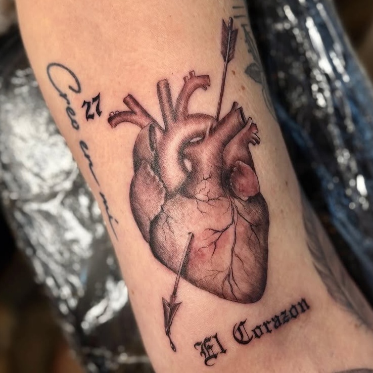 anatomical heart and arrow realism style tattoo by jamietattoos