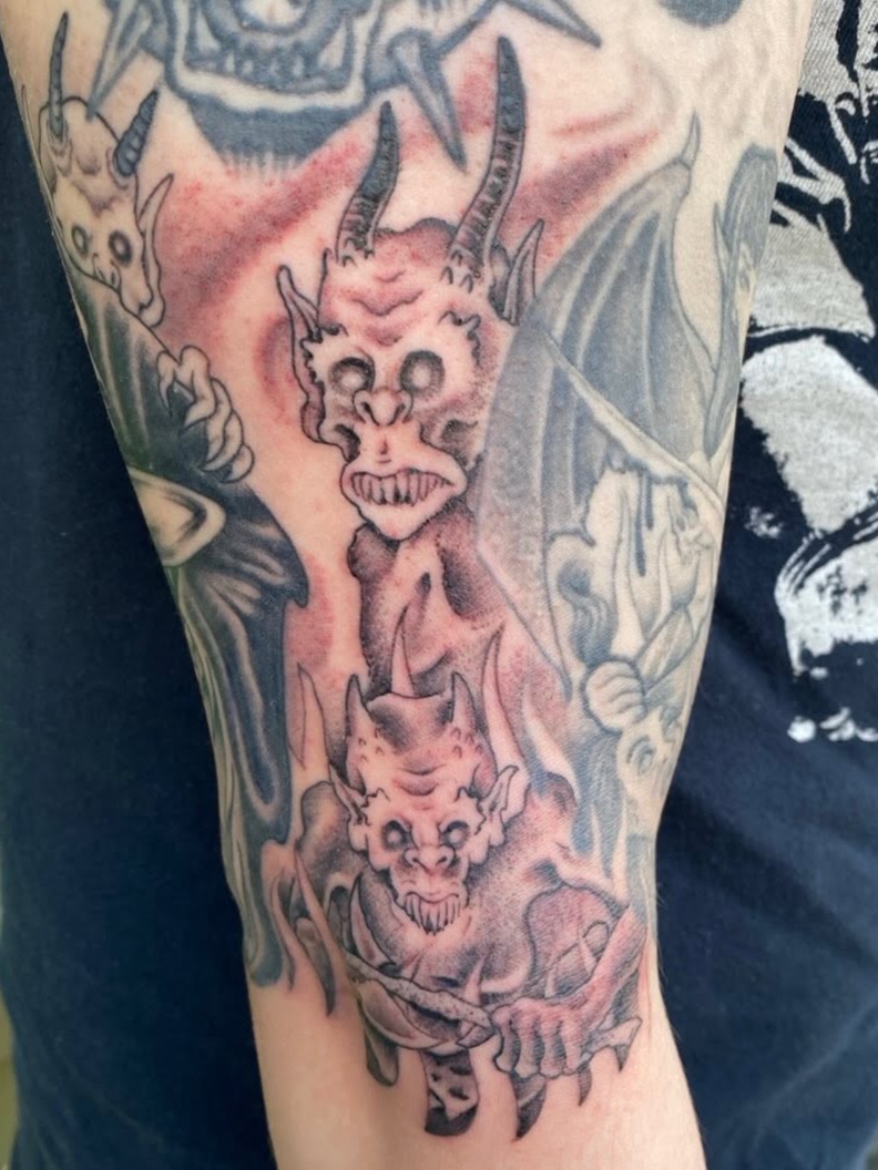 demon and devil blackwork style tattoo by Marco