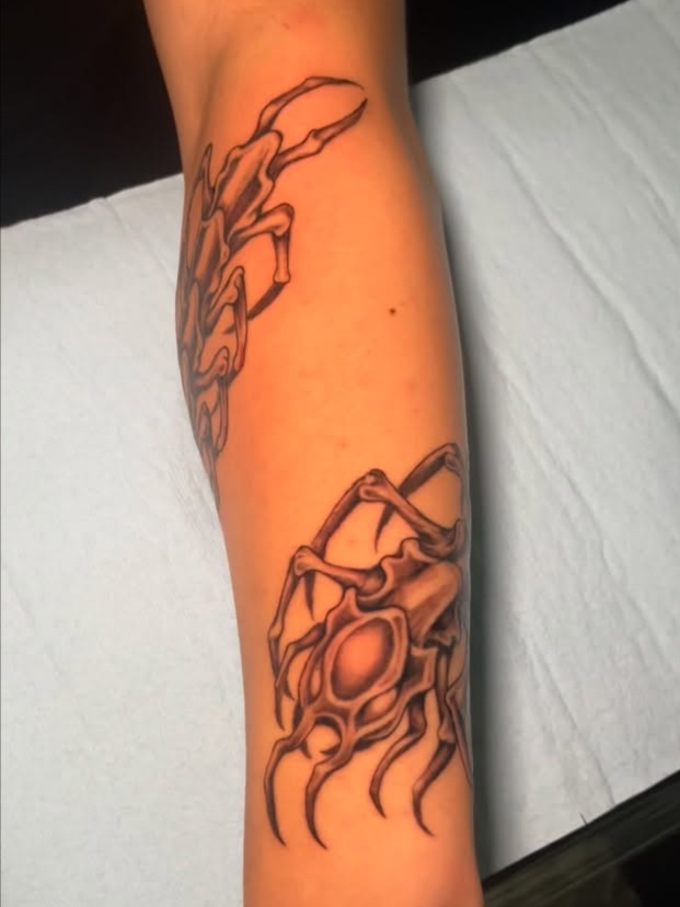 biomechanical style tattoo by Kahiau Beamer