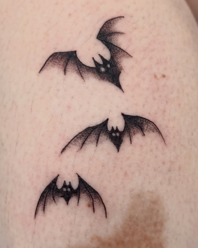 blackwork style tattoo by Manny